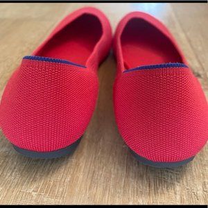 Red flat shoes